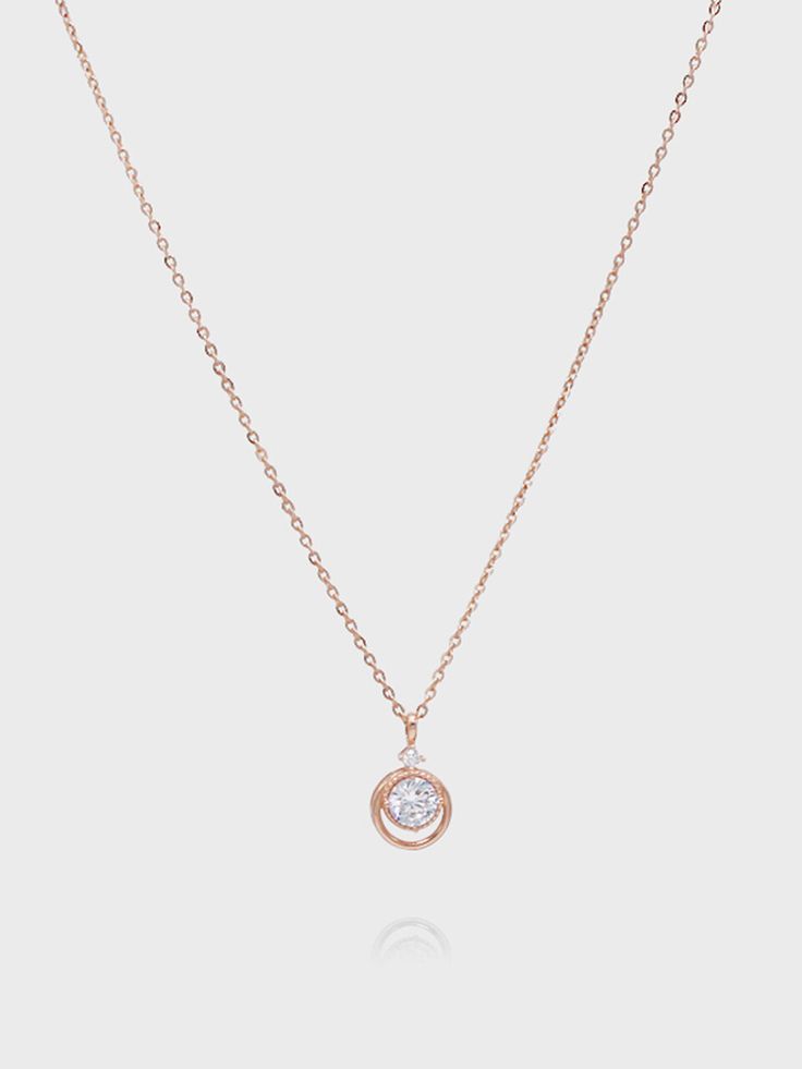 Editor's Notesdmoment presents sophisticated accessories with trendy designs that exude a feminine vibe. - Circular frame- Made of 14K rose gold- Cubic embellished in the middle- Smooth and glossy surface- Sophisticated and feminine mood Measurements (in.)One Size- Chain: 15.75 in. (L)- Pendant: 0.28 in. (W) * 0.31 in. (H) Composition & Care- Material: 14K Rose Gold, Cubic- Plated products may discolor over time due to their nature.- Please be careful that discolorat Classic Rose Gold Necklaces For Evening, Classic Rose Gold Necklace For Evening, Timeless Rose Gold Jewelry For Evening, Rose Gold Jewelry With Diamond Accents For Evening, Modern Rose Gold Necklace With Brilliant Cut, Luxury Rose Gold Jewelry With Timeless Design, Timeless Rose Gold Jewelry For Party, Chic Rose Gold Jewelry For Evening, Elegant Pink Gold Diamond Necklace