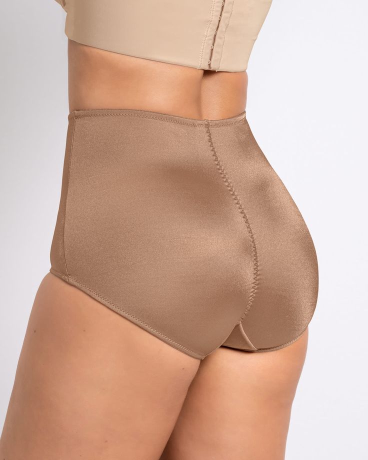 If you're looking for an effortlessly sculpted figure, this original panty is for you. It has an inner layer of our trademark PowerSlim firm compression fabric. This shaping panty is high-waisted to cover and flatten your whole tummy. The ruched seam in the back gives your butt a little lift. With i Full Coverage Shapewear Bottoms With Contoured Waistband, Classic Stretch Bottoms With Contoured Waistband, Solid Color Brief Shapewear Bottoms, Elegant Solid Bottoms With Contoured Waistband, Stretch Full Coverage Shapewear Bottoms, Full Coverage Stretch Shapewear Bottoms, Stretch Bottoms With Contoured Waistband, Elegant High-cut Leg Bottoms In Solid Color, Fitted Classic Nylon Bottoms