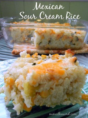 mexican sour cream rice casserole on a plate with another dish in the background