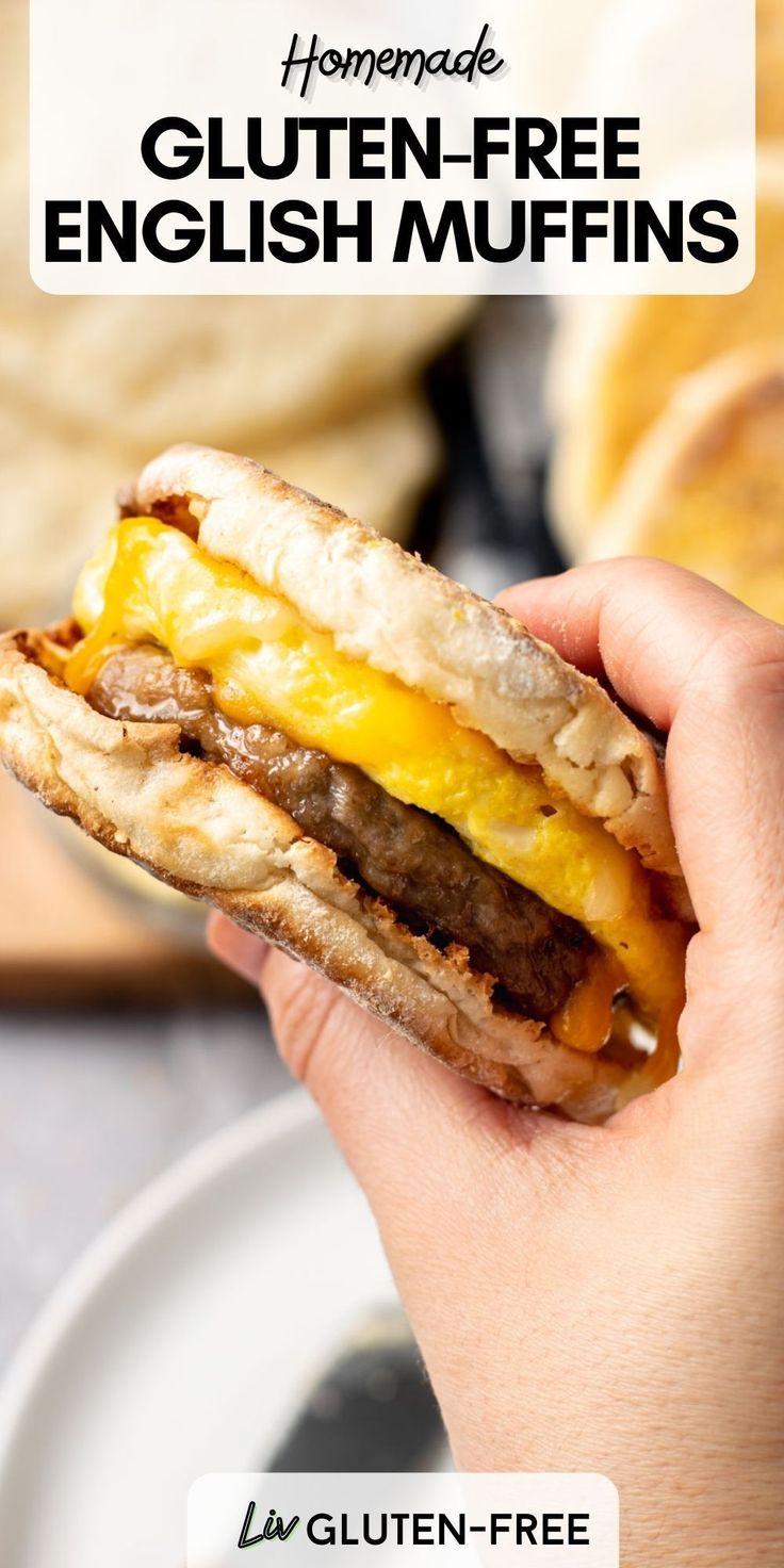 a person holding a sandwich in their hand with the words homemade gluten - free english muffins