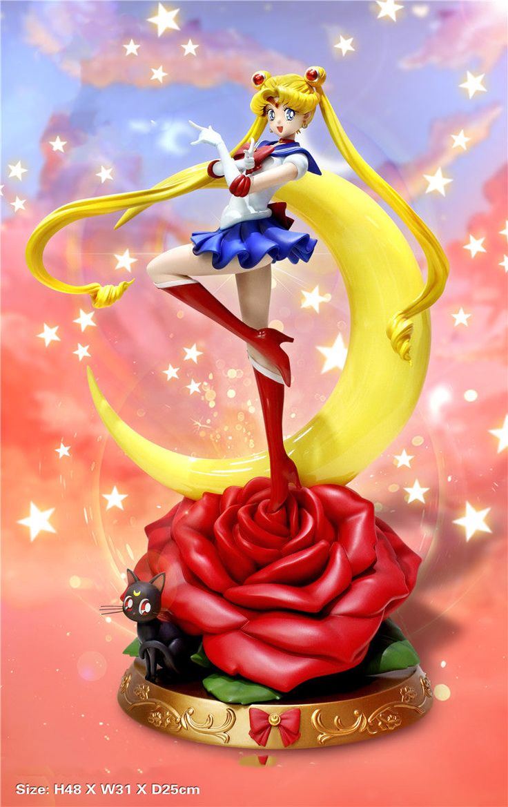 sailor moon figurine sitting on top of a rose with stars in the background