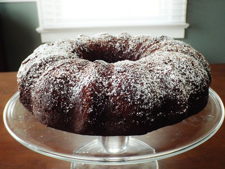 a bundt cake sitting on top of a glass plate