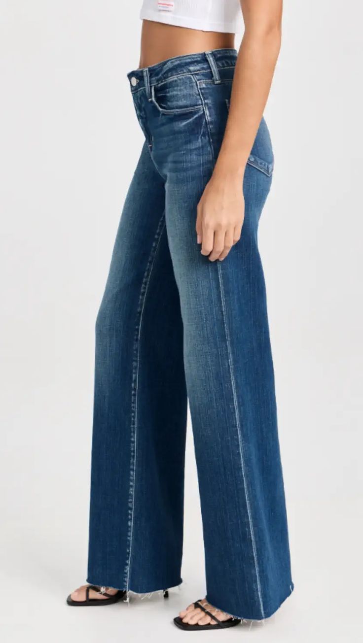 L'AGENCE Scottie High Rise Wide Leg Jeans | Shopbop Dark Wash Flare Jeans With Seam Detailing For Spring, Fall Dark Wash Bottoms With Seam Detailing, High Rise Flare Jeans With Seam Detailing For Fall, Stretch Bottoms With Frayed Straight Hem, Stretch Bottoms With Frayed Hem, Stretch Bottoms With Frayed And Straight Hem, Fall Jeans With Seam Detailing In Medium Wash, Fall Medium Wash Jeans With Seam Detailing, Denim Blue Flare Jeans