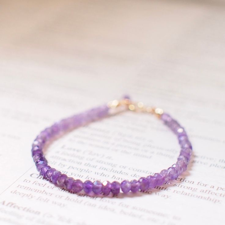 >> Like my design? Follow me on Instagram to stay updated on new design and watch  product video! << http://instagram.com/faithanddeedsjewelry This beautiful bracelet is made with faceted purple amethyst rondelles. This design can stack elegantly with other bracelets or bangles.  Amethyst measures approx. 3x4mm each Round clasp closure and all the findings used are 14K gold-filled. Bracelet shown in the pictures measures 6.5 inches long (16.5cm).  Options of length available for selection. This Elegant Feminine, Product Video, Amethyst Bracelet, My Design, Purple Amethyst, Beautiful Bracelet, New Design, Arm Band, Gold Filled