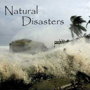 waves crash on the beach and palm trees in front of a destroyed building, which is surrounded by water