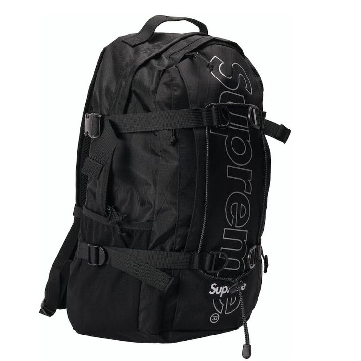 A Long-Standing Tradition, Supreme Has Been Releasing Backpacks Every Year Since The Mid-1990s. Their Backpacks Have Ranged From Subtle Solid Colored Bags To Wild All-Over Patterns. This Fw18 Supreme Backpack Sits Somewhere Between The Subtle And Loud, With A Clean All-Black Design, Chain-Link Style Pattern, And Reflective 3m Logo Stretching The Length Of The Bag. Constructed With Dimension-Polyant Vx21-Rs 4-Layered Fabric, This Backpack Boasts Multiple Zippered Compartments And Mesh Side Pocket Rocket Backpack, Supreme Backpack, Supreme Clothing, Mesh Backpack, Supreme Bag, Red Backpack, Purple Backpack, Cute Rappers, Blue Backpack