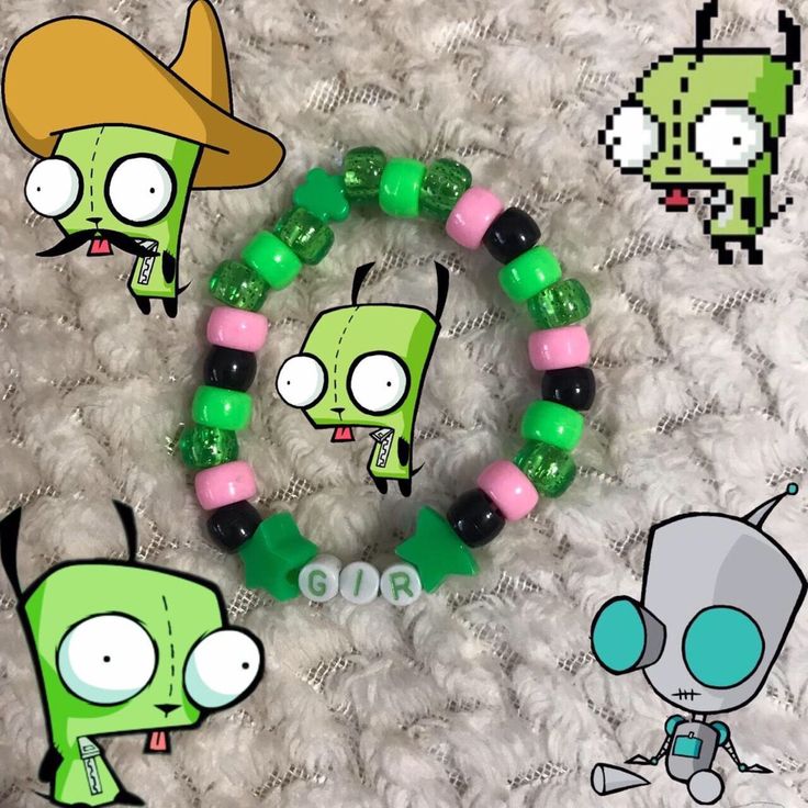 two bracelets with green and pink beads are on a white surface next to an image of a cartoon character