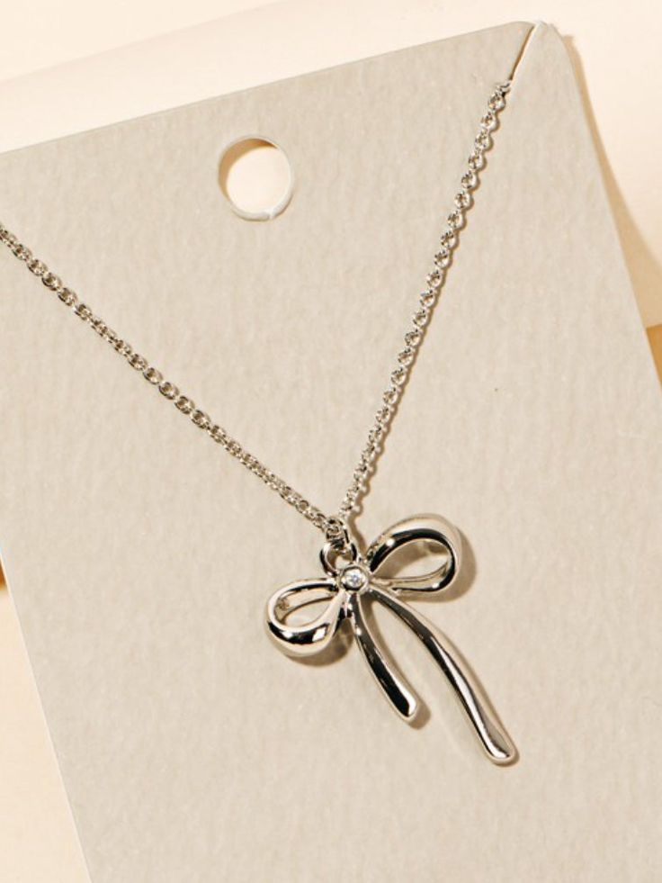 silver bow necklace Trendy 16 Inch Jewelry Gift, Silver Bow Jewelry, Trendy Clavicle Chain Necklace As Gift, Chic Clavicle Chain Charm Necklace For Gift, Chic Clavicle Chain Charm Necklace As Gift, Cute Silver Clavicle Chain Jewelry, Casual Clavicle Chain Necklace For Gift, Casual Clavicle Chain Necklace As Gift, Trendy Pendant Charm Necklace Gift For Her