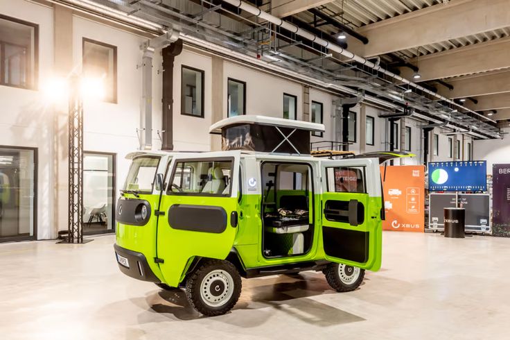 an electric vehicle is parked in a large building