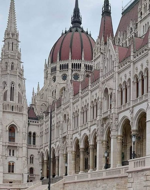 an old building with many towers and arches