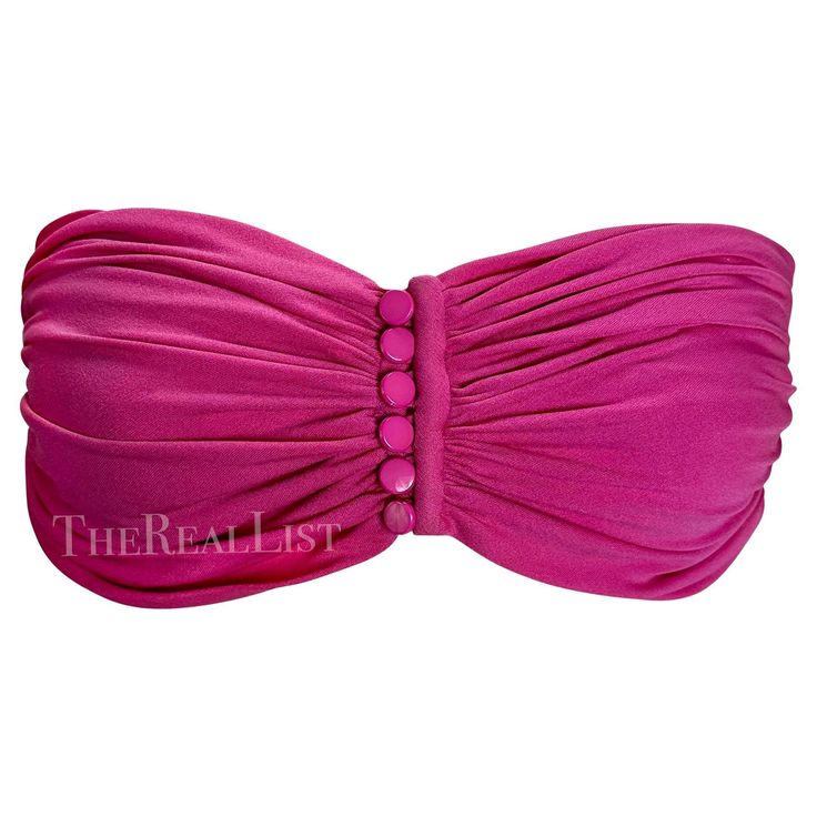 Presenting a fabulous hot pink Valentino Night bandeau top. From the 1980s, this beautiful ruched crop top features a button-down closure between the breasts. This ultra-sexy top is the perfect timeless vintage addition to any modern wardrobe! Approximate measurements: Size - 10US Top of bust to hem: 5 - 9" Bust: 29 - 32" Chic Fitted Tube Top With Buttons, Pink Ruched Bandeau Top, Elegant Pink Bandeau Tube Top, Pink Tube Top For Summer Evening, Fitted Summer Tube Top With Buttons, Summer Ruched Pink Tube Top, Summer Pink Ruched Tube Top, Pink Ruched Tube Top For Summer, Pink Bandeau Tube Top For Evening