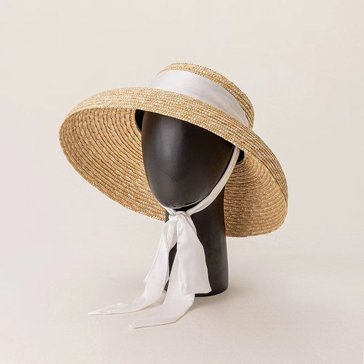 Discover the Perfect Summer Companion Embrace the sun while staying cool and protected with our Stylish Wide Brim Summer Beach Straw Hat. Perfectly blending fashion with function, this hat is designed for both men and women who enjoy the outdoors while looking effortlessly chic. Whether you're planning a day at the beach, a stroll through the park, or an outdoor gathering, this hat promises to elevate your style and provide essential sun protection. Exceptional Features Our straw hat is crafted from high-quality materials, ensuring breathability and comfort. The unique lamp shape design not only stands out but also provides ample shade, protecting your face and neck from the sun's harmful UV rays. Its solid pattern and neutral color make it versatile enough to complement any summer outfit. Beach Straw Hat, Wide Brim Straw Hat, Boho Hat, Beige Boho, Unique Lamps, Beach Hat, Hat Pins, Brim Hat, Sun Hat