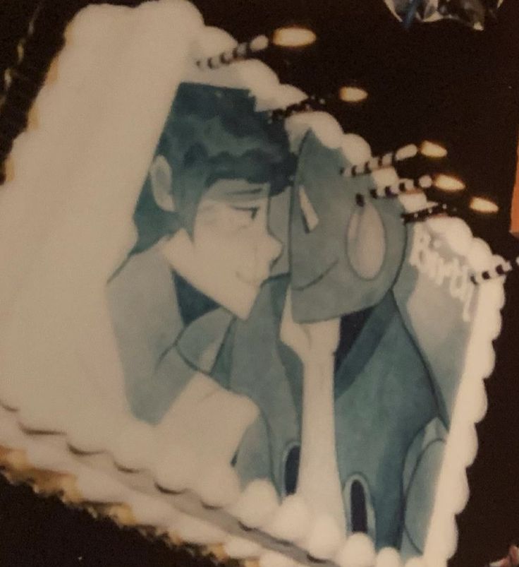 a cake with an image of two people on it