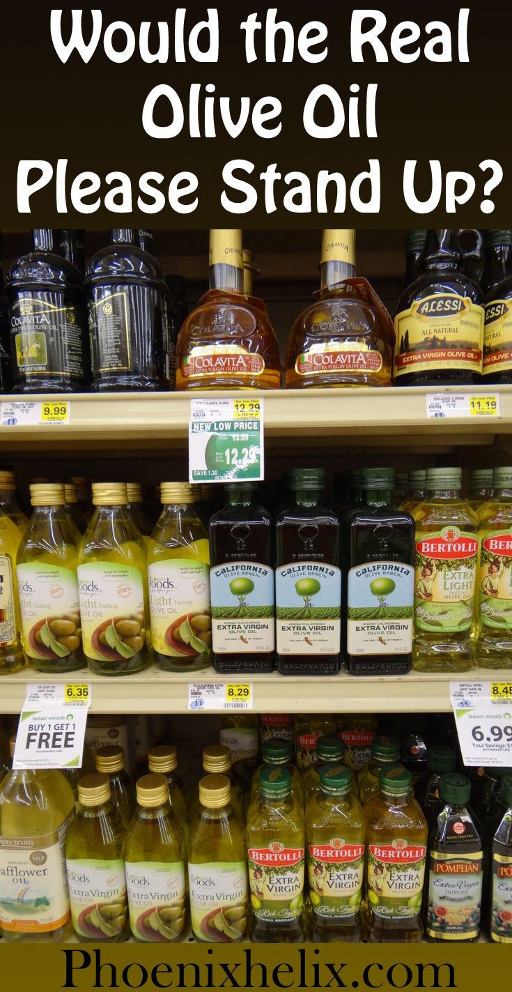 bottles of olive oil are on display in a store with the words would the real olive oil stand up?