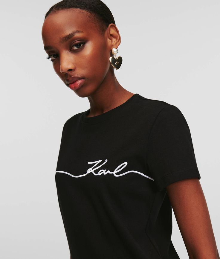 Crafted from heavy organic cotton, this classic crew-neck T-shirt is defined by an embroidered KARL Signature logo across the chest. Pair yours with matching KARL Signature sweatpants. Rock Chic, Beach Wear Dresses, Sleepwear & Loungewear, Shopper Tote, T Shirt For Women, Signature Logo, Blouse Dress, Tote Backpack, Evening Clutch Bag