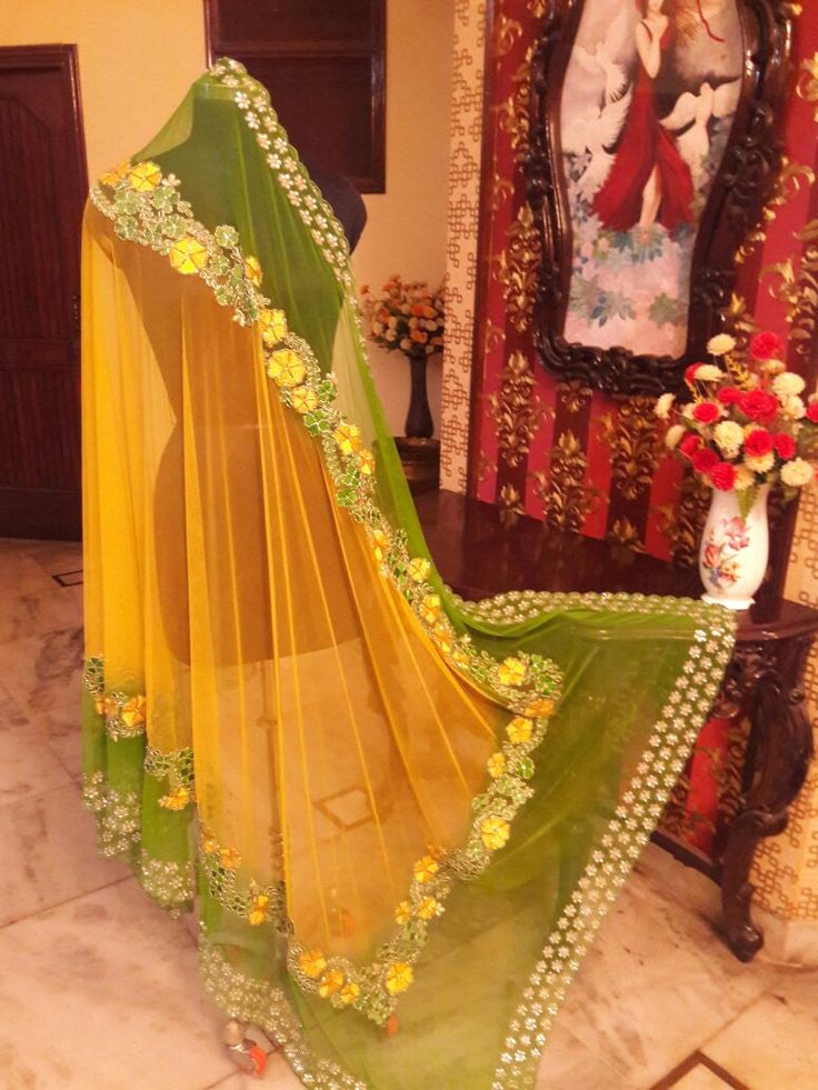 This lehenga is made in dupion silk with full handwork thread embroidery. The dupatta of this outfit has 2 options, one with Single color with single border embroidery( as on model) and Second option with double colour with 2 Borders of embroidery (as on dummy). Luxury Raw Silk Dupatta With Multicolor Embroidery, Luxury Multicolor Dupatta With Dori Work, Luxury Multicolor Dupatta With Motifs, Luxury Embroidered Dupatta With Multicolor Embroidery, Luxury Multicolor Fusion Style Dupatta, Luxury Fusion Multicolor Dupatta, Luxury Dupatta With Intricate Multicolor Embroidery, Luxury Multicolor Embroidered Dupatta With Zari Weaving, Luxury Multicolor Embroidered Dupatta For Traditional Ceremonies