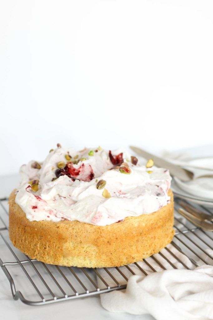 a cake sitting on top of a cooling rack