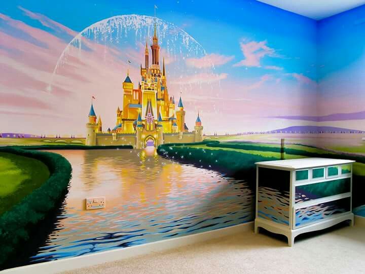 a bedroom with a mural of a castle on the wall