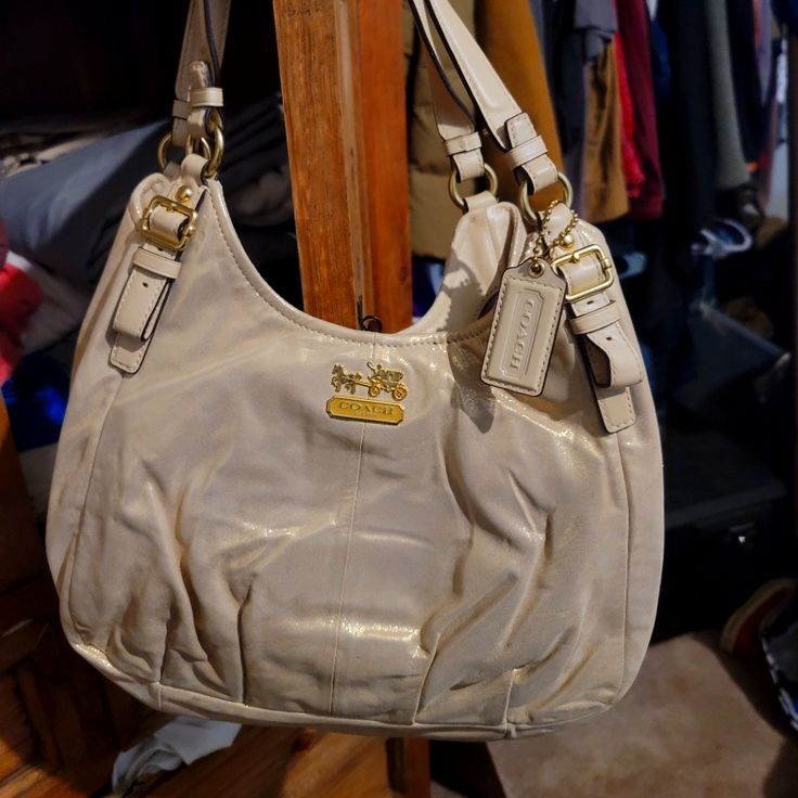 Like New. Super Cute. Soft Exterior. Everyday Satchel Hobo Bag With Branded Hardware, Satchel Hobo Bag With Branded Hardware For Everyday Use, Coach Hobo Bag With Adjustable Strap For Shopping, Cream Shoulder Bag With Branded Hardware, Coach Hobo Bag With Adjustable Strap For Errands, Hobo Satchel Bag With Branded Hardware For Everyday Use, Cream Shoulder Bag With Branded Hardware And Double Handle, Pouch Satchel With Branded Hardware, Coach Cream Hobo Shoulder Bag