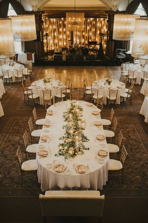 a large banquet hall with tables and chairs