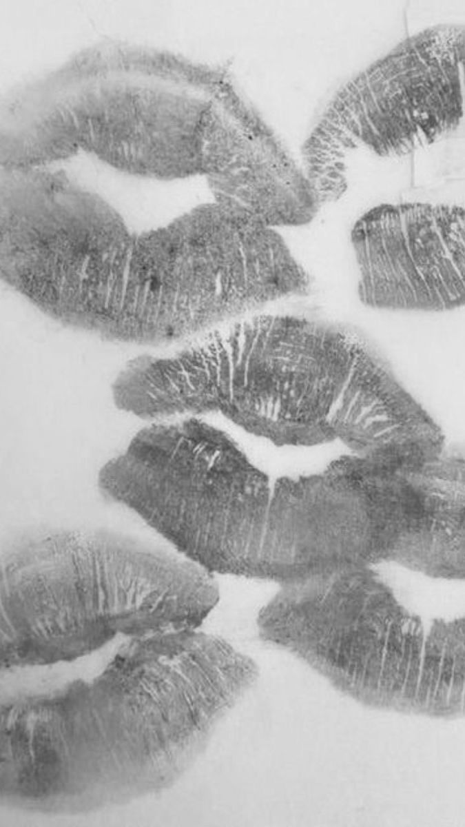 the imprints of lips are shown in black and white