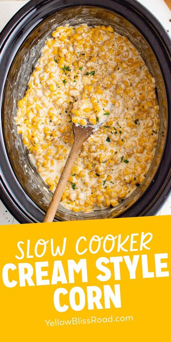 slow cooker cream style corn in a crock pot with the words slow cooker cream style corn