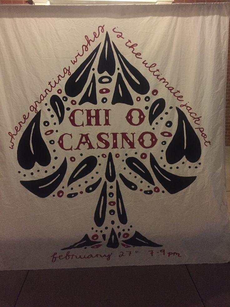 a white banner with black and red lettering on it that says chio casino in the center