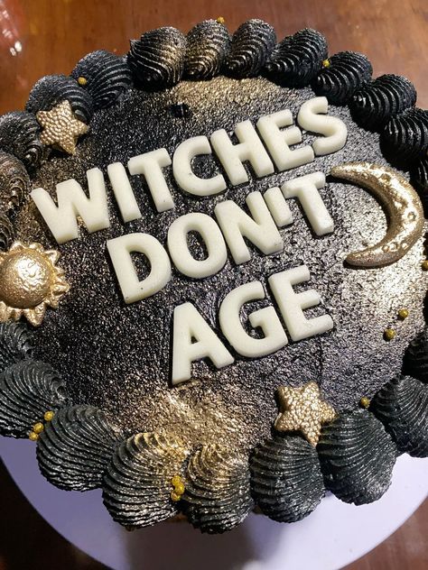 a cake with the words witches don't age on it