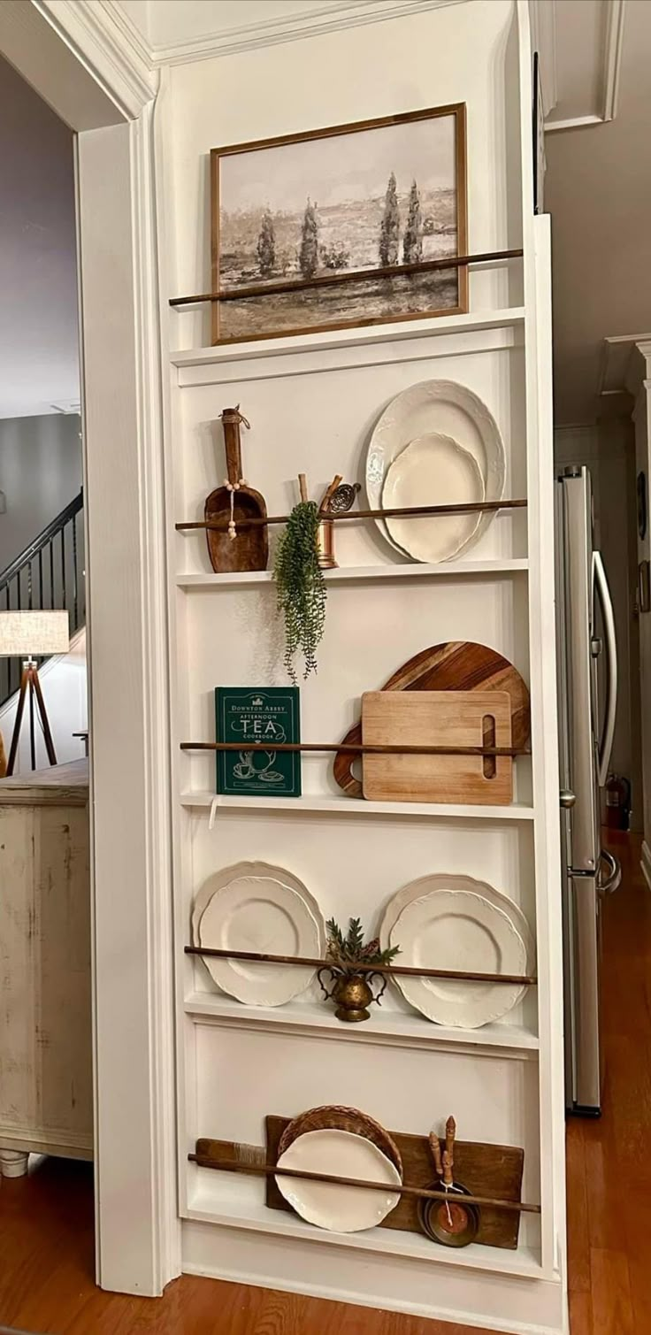 a shelf with plates and other items on it