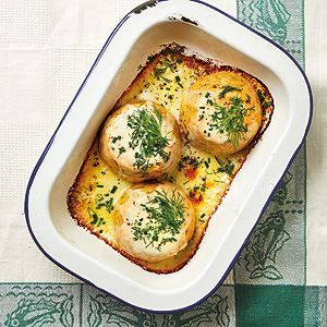 a casserole dish filled with bread and vegetables