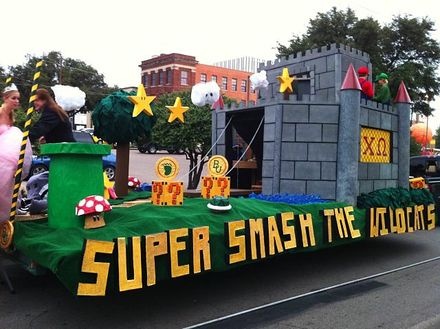 a parade float with people riding in it