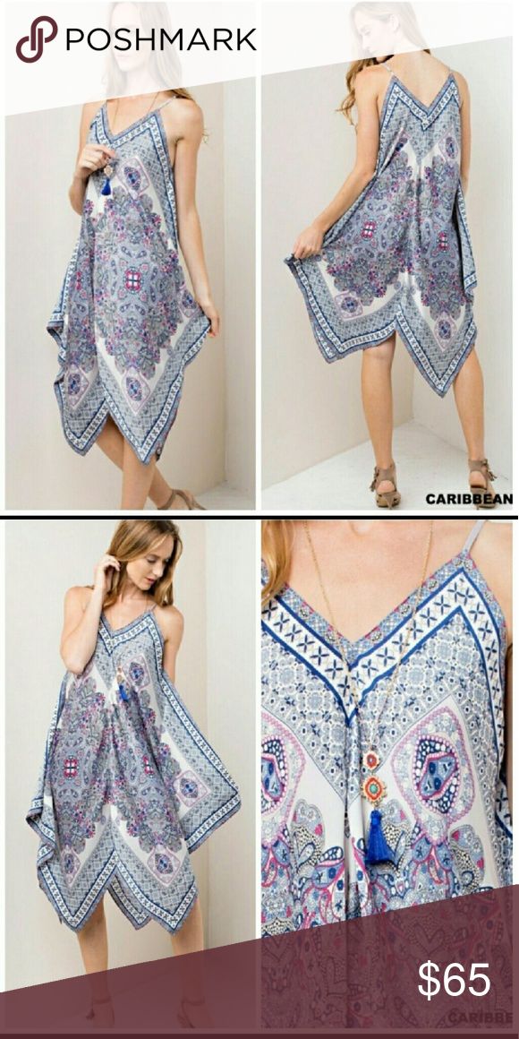 BEAUTIFUL HANDKERCHIEF DRESS, BLUE Beautiful Handkerchief Dress, Blue.  This dress is amazing with a handkerchief hemline and features adjustable spaghetti straps. Beautiful shades of blue and pink and a paisley pattern. This is the dress of the summer. Sizing is S/M and M/L. Dresses Asymmetrical Summer Beach Dress With Handkerchief Hem, Bohemian Blue Dress With Handkerchief Hem, Blue Summer Dress With Handkerchief Hem, Summer Sundress With Handkerchief Hem, Flowy Blue Dress With Handkerchief Hem, Blue Flowy Dress With Handkerchief Hem, Flowy Handkerchief Hem Beach Dress, Casual Blue Handkerchief Hem Dress, Purple Paisley Print Dress For Summer