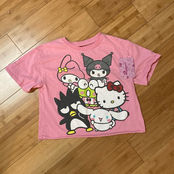 Hello Kitty And Friends T-Shirt, So Adorable! New With Tags. Juniors’ Medium. 90s Short Sleeve Tops With Character Print, Fun Hello Kitty Short Sleeve Tops, Hello Kitty Crew Neck Fun Tops, Hello Kitty Fun Crew Neck Top, Trendy Hello Kitty Short Sleeve Top, Trendy Short Sleeve Hello Kitty Top, Hello Kitty Graphic Crew Neck Top, Hello Kitty Graphic Crew Neck Tee, Hello Kitty Graphic Tee With Crew Neck