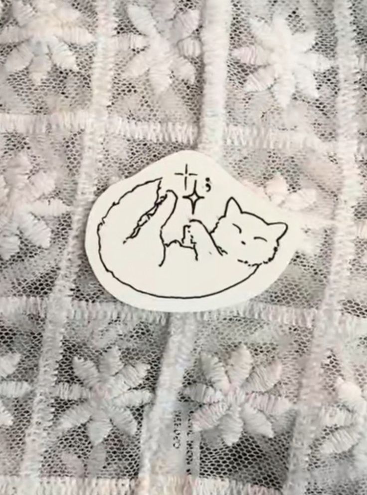 a white sticker with a cat on it's back and the words i love you