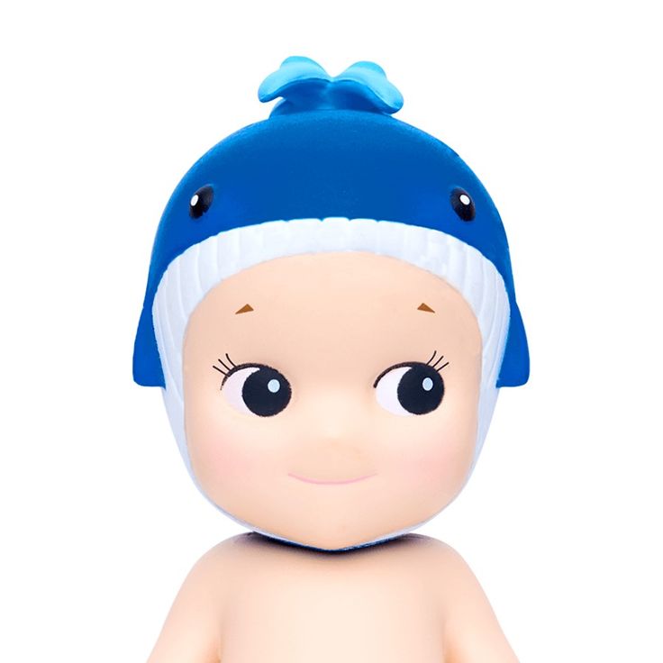 a baby doll wearing a blue and white hat