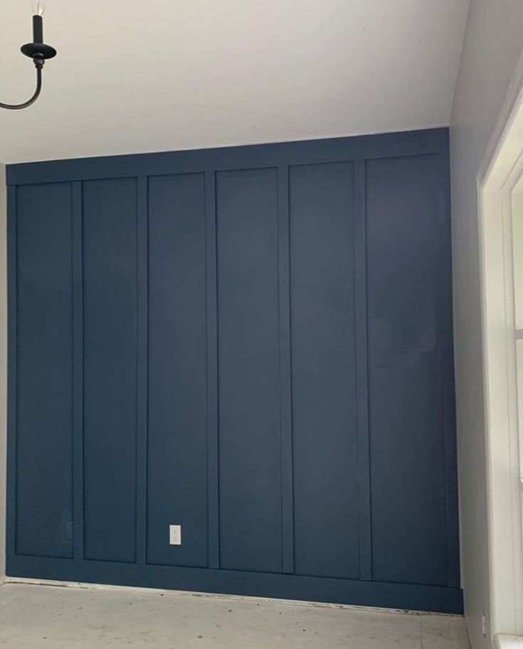 Follow for our rental transformations on Instagram @daytripperairbnb Blue Note Benjamin Moore Accent Walls, Navy Benjamin Moore Paint, Vandusen Blue Benjamin Moore, Newbury Port Blue Benjamin Moore, Bm Britannia Blue, Newberry Port Blue Benjamin Moore, Bm Newburyport Blue, Navy Blue Board And Batten Wall, Navy Blue Shiplap Wall