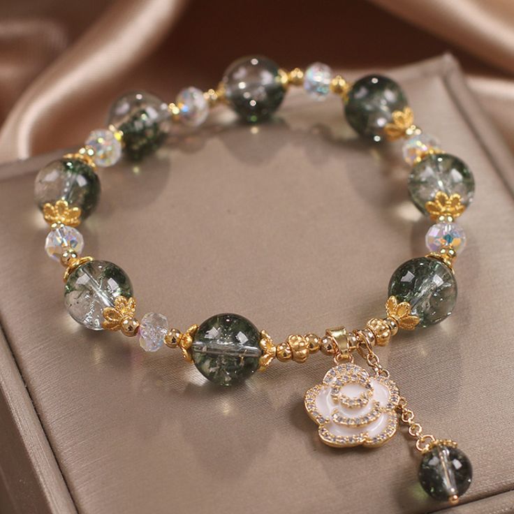 This beautiful bracelet adds elegance to your outfit. Each piece has a stunning and unique appearance. this is your choice. Natural crystal Bead diameter: 8 mm Lobster clasp-size can be adjusted - Suitable for hand circumference: 14-18 CM Hypoallergenic, lead & nickel free *We carefully select each gemstone to offer gems with the best quality. As gemstones are natural materials, stone colors may vary slightly from the images, making this beautiful bracelet completely unique, just like you!If you aren't in LOVE with your purchase, please let us know within 30 days of receiving your item, and you'll receive a stress-free refund. Elegant Adjustable Crystal Stretch Bracelet, Elegant Stretch Bracelet With Spacer Beads, Elegant Adjustable Stretch Bracelet With Round Beads, Elegant Stretch Bangle Bracelet Gift, Elegant Crystal Bracelets With Gemstone Beads, Elegant Stretch Bracelet With 8mm Beads, Elegant Green Stretch Bracelet With Round Beads, Elegant Round Beads Stretch Bracelet Gift, Elegant Beaded Charm Bracelet