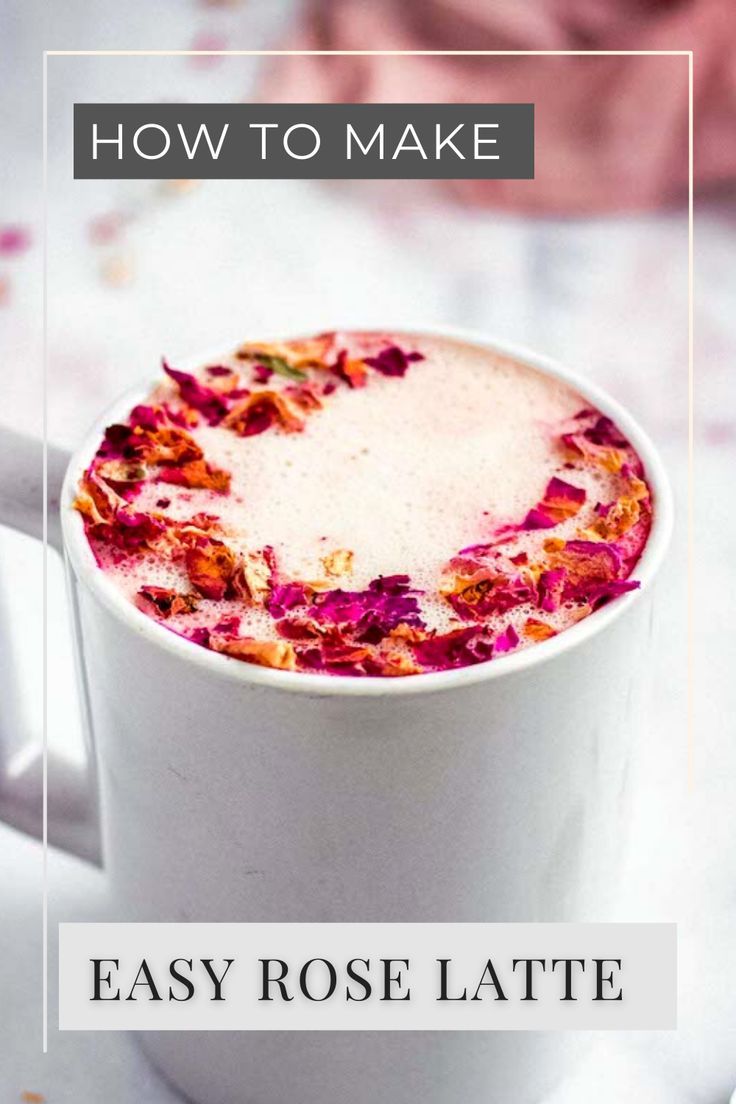 a white mug filled with pink flowers and the words how to make easy rose latte