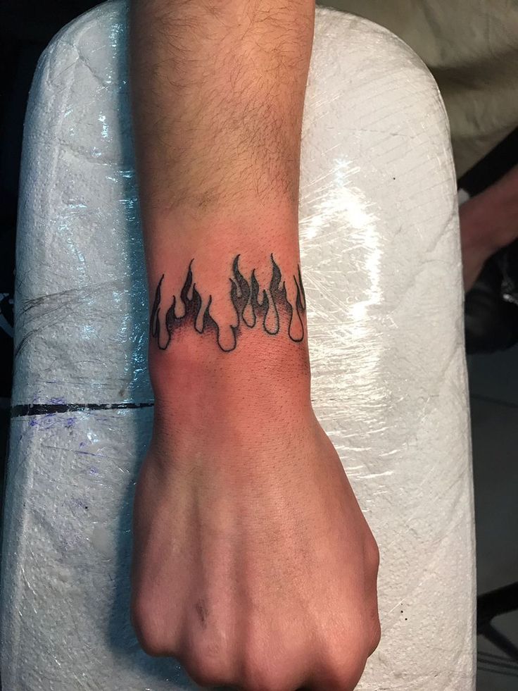 Flame Around Wrist Tattoo, Arm Flame Tattoo, Fire Tattoo Designs Men, Flame Band Tattoo, Loner Tatoos, Blue Fire Tattoo, Flame Wrist Tattoo, Fire Arm Tattoo, Tattoo Ideas Fire