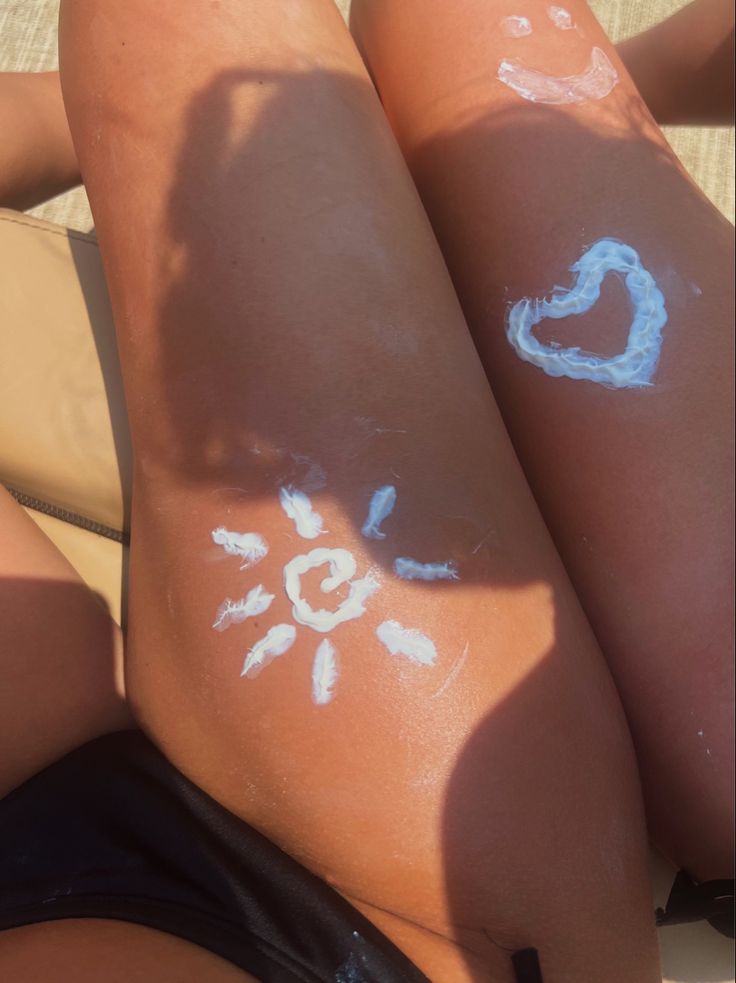 sunscreen tattoos, swirly sun, art Suntan Tattoo, Coastal Tattoos, Tattoos Y2k, Y2k Tattoos, Sunscreen Tattoo, Tanning Tattoos, 16 Aesthetic, Beach Tattoos, Tattoos Creative