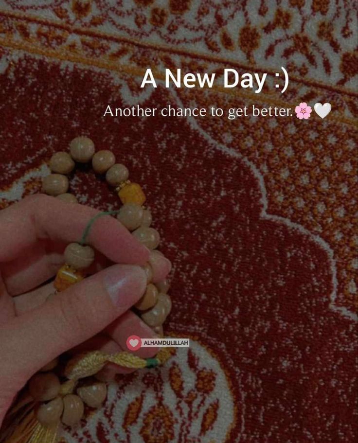 someone is holding beads in their hand and the text reads, a new day another chance to get better