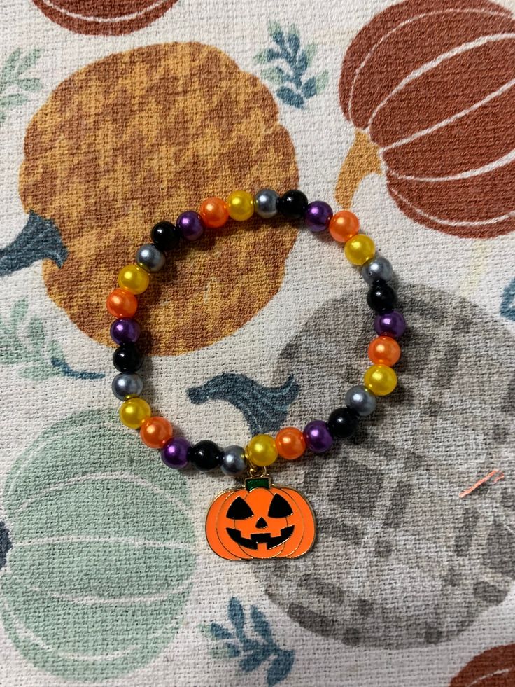 Colorful Halloween Bracelet! Handmade Stretch Bracelet For Halloween, Fun Orange Halloween Jewelry, Fun Orange Jewelry For Halloween, Handmade Multicolor Bracelets For Halloween, Halloween Novelty Multicolor Beaded Bracelets, Halloween Gift Stretch Bracelet, Novelty Multicolor Beaded Bracelets For Halloween, Multicolor Novelty Bracelets For Halloween, Orange Halloween Gift Bracelet