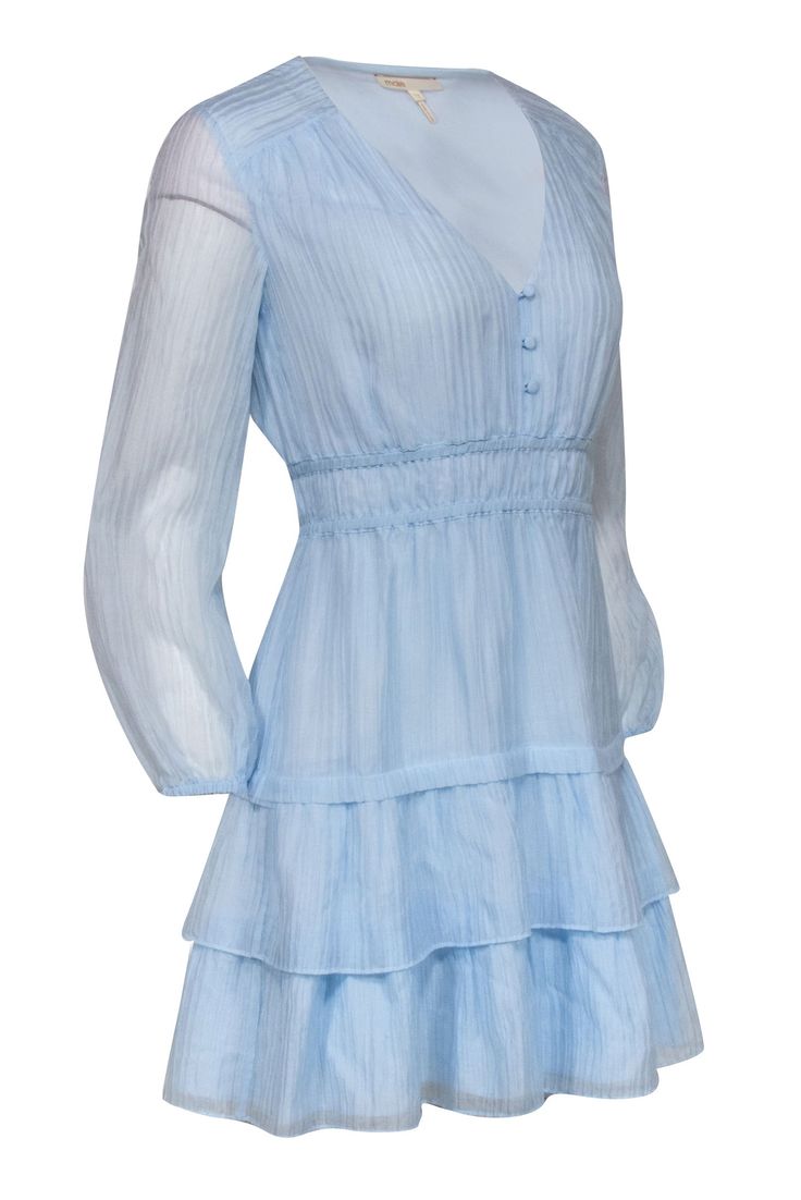 This Maje light blue mini dress showcases delicate ruffles and pleated tiers that flow with your movements, creating a dream-like aesthetic that's difficult to ignore while the deep v-neckline and elastic cuff long sleeves elevate the elegant appeal of this lightweight plain woven fabric. Ideal for garden parties or weddings, pair with sandals & a standout necklace for a fairy tale-inspired look. Size 2 (FR 34) Shell 64% Lyocell 36% Polyamide Lining 100% Viscose Pleated throughout Tiered ruffle Spring Light Blue Mini Dress With Ruffle Hem, Blue V-neck Tiered Dress With Ruffle Hem, Light Blue Ruffled V-neck Mini Dress, Light Blue V-neck Mini Dress With Ruffles, Light Blue V-neck Mini Dress With Ruffle Hem, Light Blue Ruffled Mini Dress For Spring, Spring Light Blue Mini Dress With Ruffles, Blue Tiered Mini Dress With Ruffle Hem, Blue Tiered Skirt Mini Dress For Spring