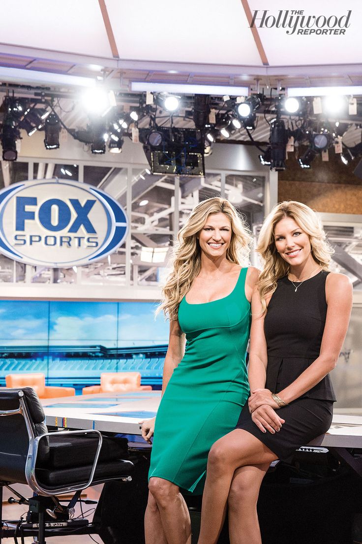 two beautiful women sitting next to each other in front of a tv studio with the fox sports logo behind them