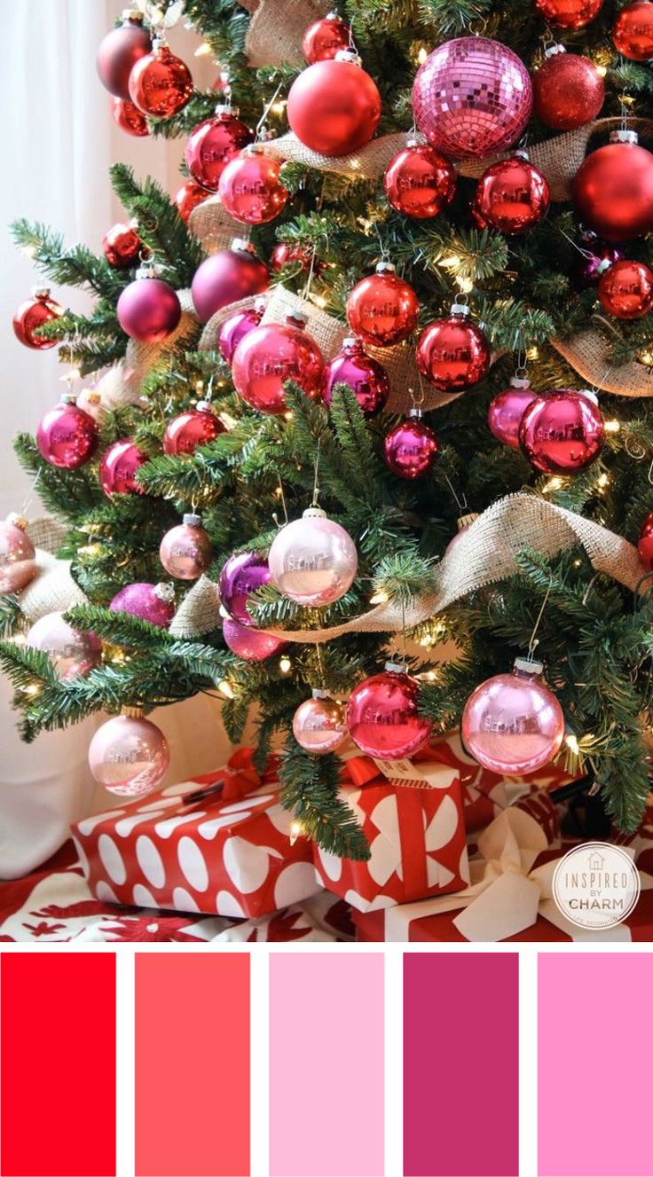 a christmas tree decorated with red and pink ornaments