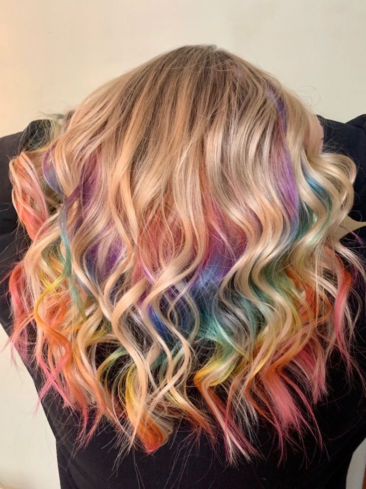 Blonde Hair Rainbow Underneath, Peekaboo Rainbow Hair Blonde, Multi Colored Blonde Hair, Rainbow Hair Color Ideas For Blondes, Peekaboo Pastel Hair, Rainbow Balayage Brunettes, Rainbow Hair Peekaboo, Easter Hair Color, Rainbow And Blonde Hair