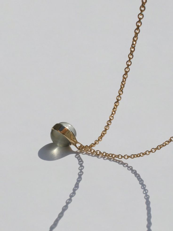 Cyril — Double Moonstone Necklace Gold Minimalist Moonstone Jewelry, Silver Brass Necklace With Cable Chain, Delicate Moonstone Pendant Jewelry, Minimalist Moonstone Jewelry With Adjustable Chain, Gold Moonstone Jewelry With Delicate Chain, Simple Silver Jewelry With Pearl Charm, Gold Moonstone Briolette Necklace, Modern Teardrop Jewelry With Pearl Charm, Modern Jewelry With Pearl Charm