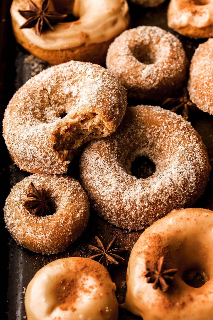 cinnamon spiced apple cider donuts on a tray