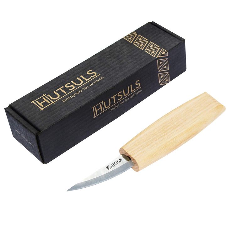 a knife with a wooden handle next to a box