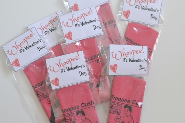 valentine's day candy wrapped in cellophane and packaged with pink frosting